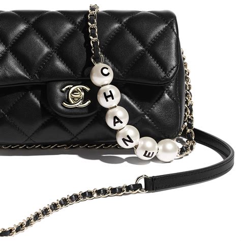 chanel pearl bag fake|chanel bag with pearls strap.